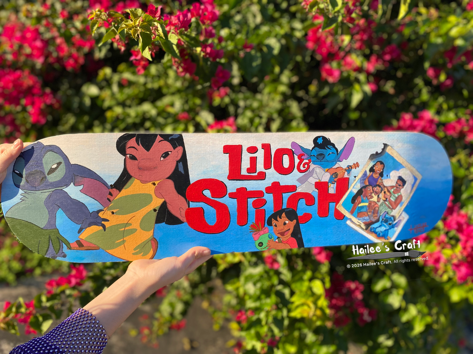 Hand painted Lilo & Stitch inspired skateboard.